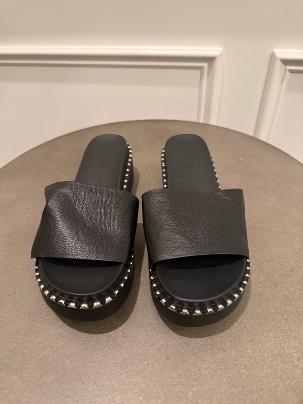 Black Leather Slide Sandals with Studded Sole Accent